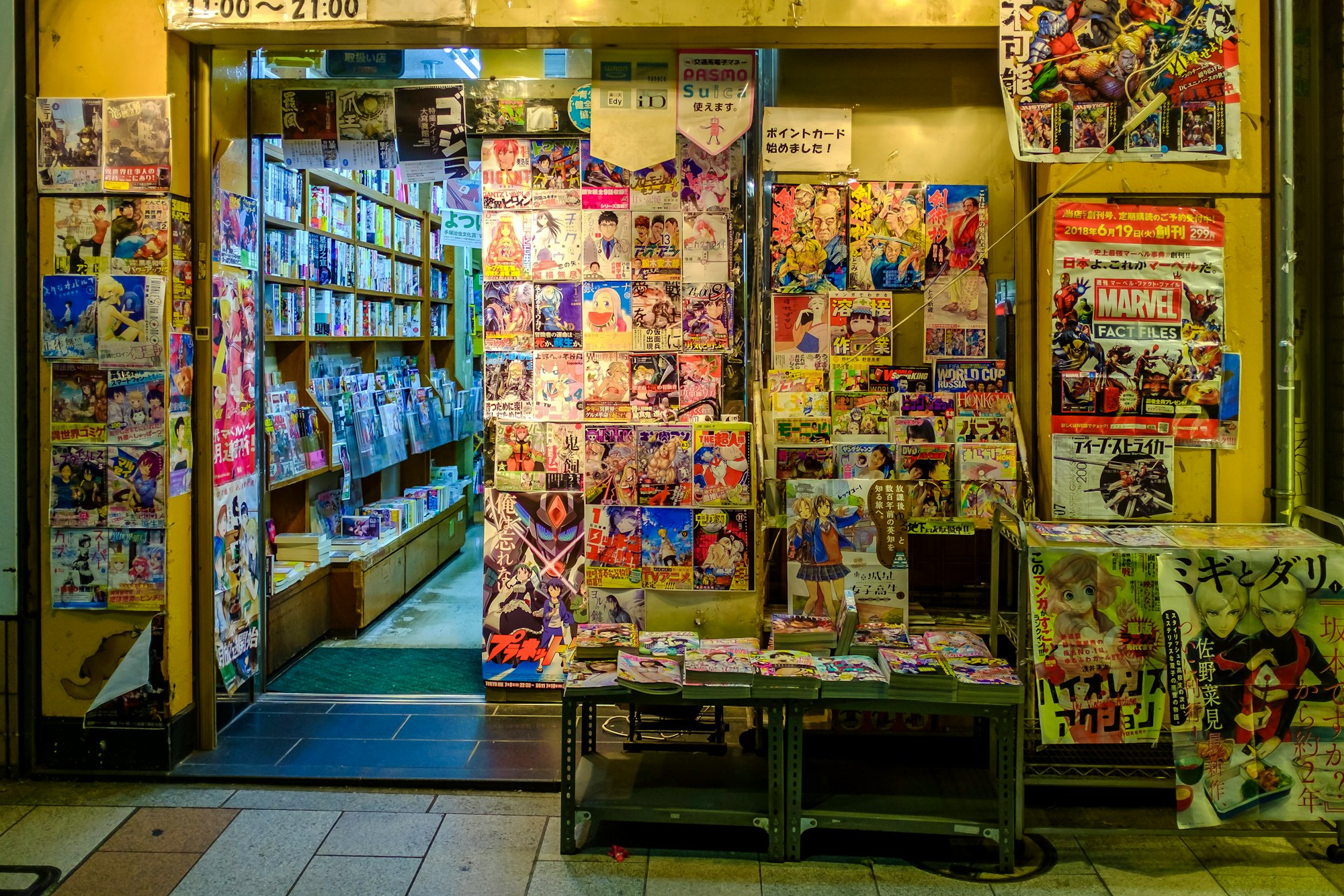 Comic book store in Tokyo Japan.Tokyo is the combination of 26 neighbourhoods, every singel one with it's own identity. Every neighbourhood has a commercial area the has neon, shops, restaurants and people. 