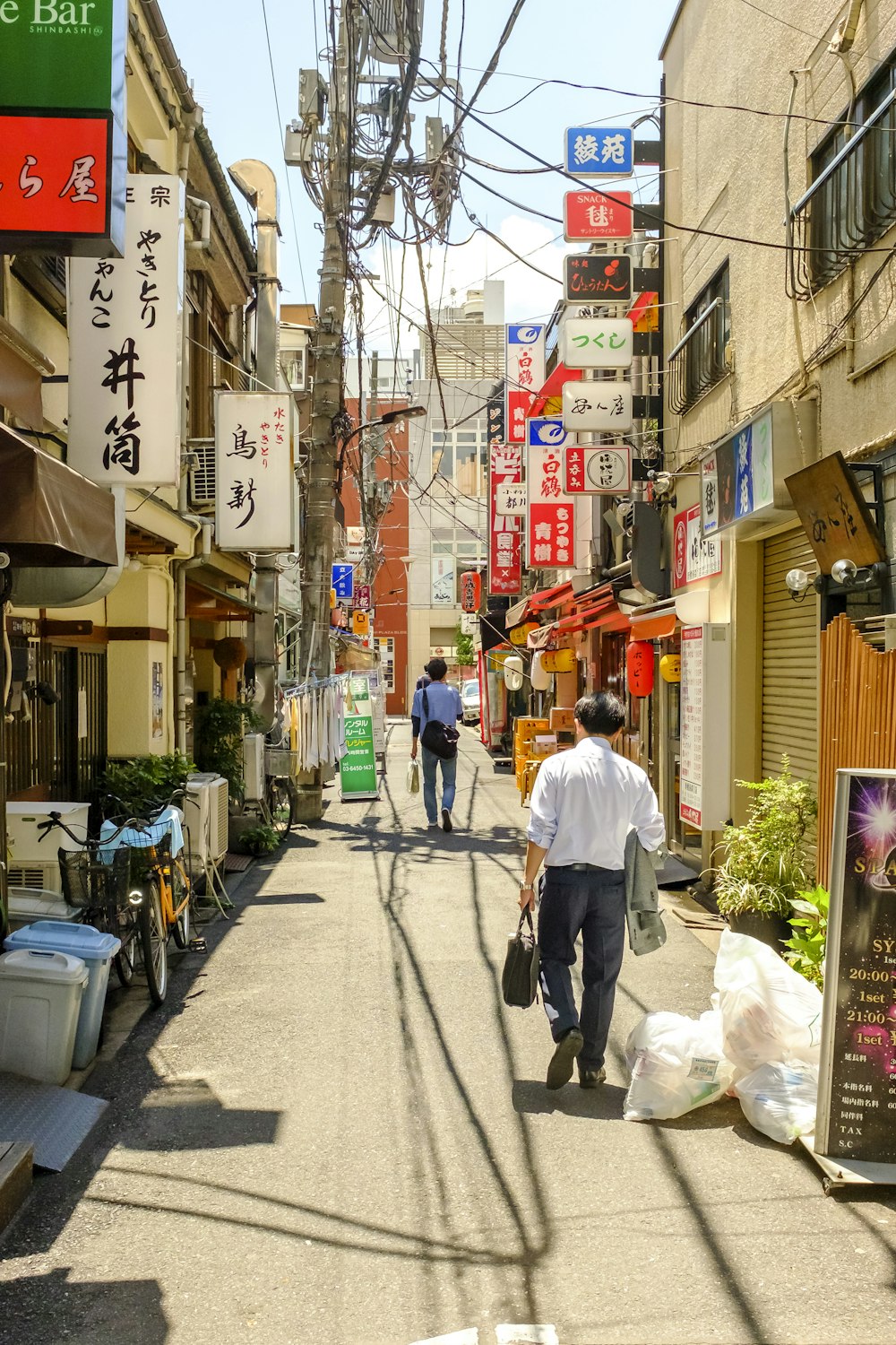 man walking near buildings