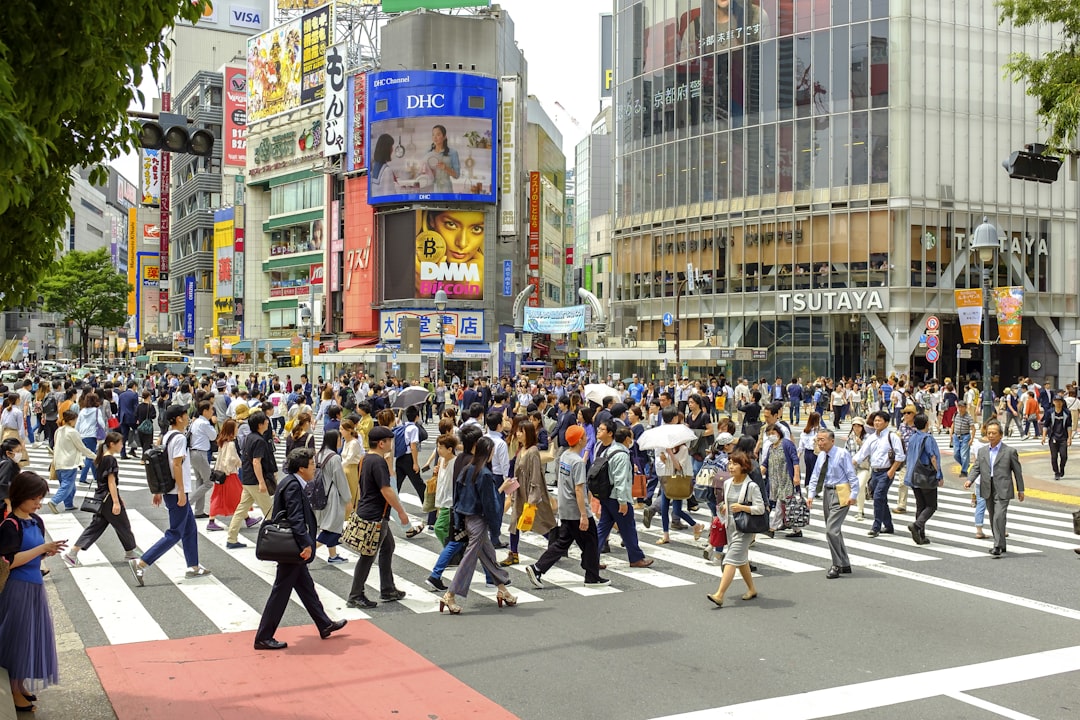 people on road, The world-famous Shibuya Crossing in Tokyo is often called the world
