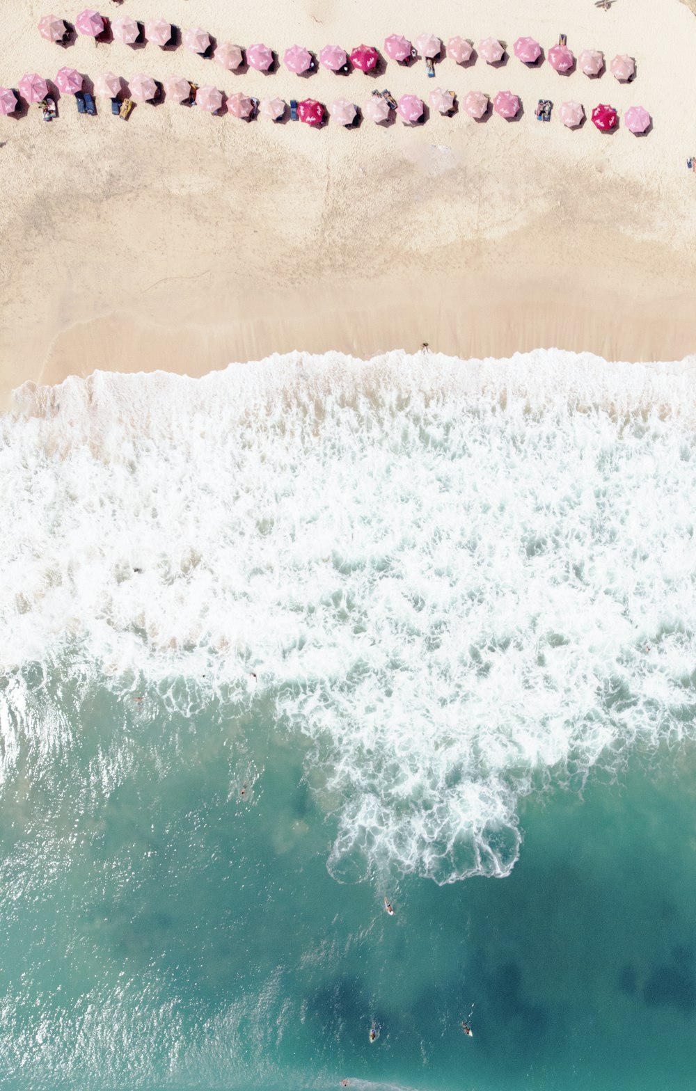 wavy seashore in aerial photography during daytime