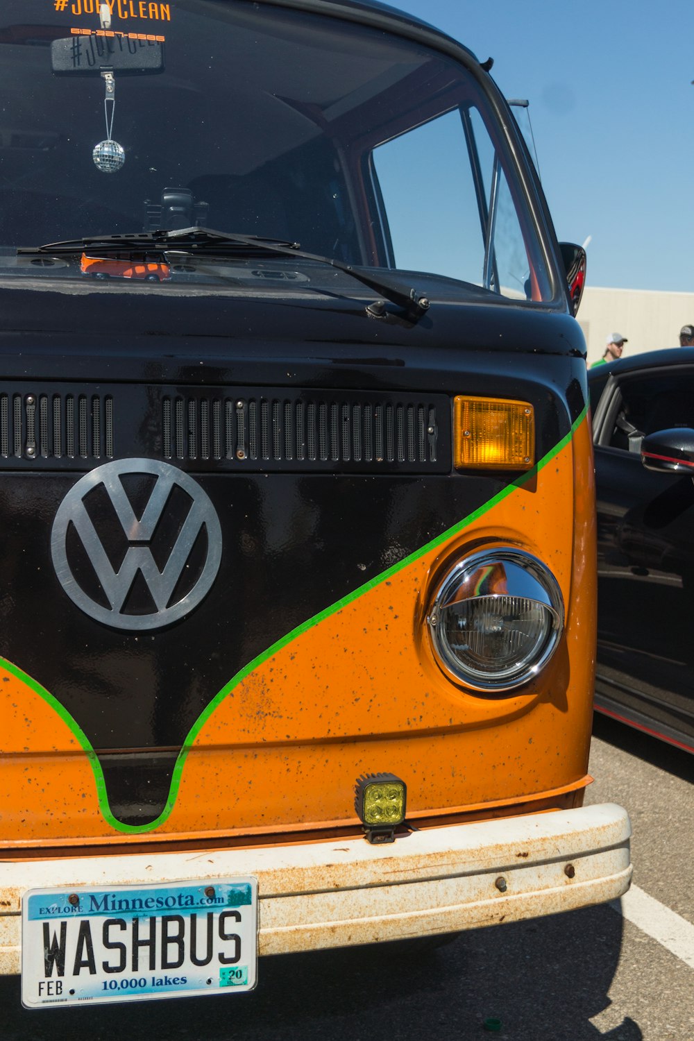 orange and black Volkswagen van