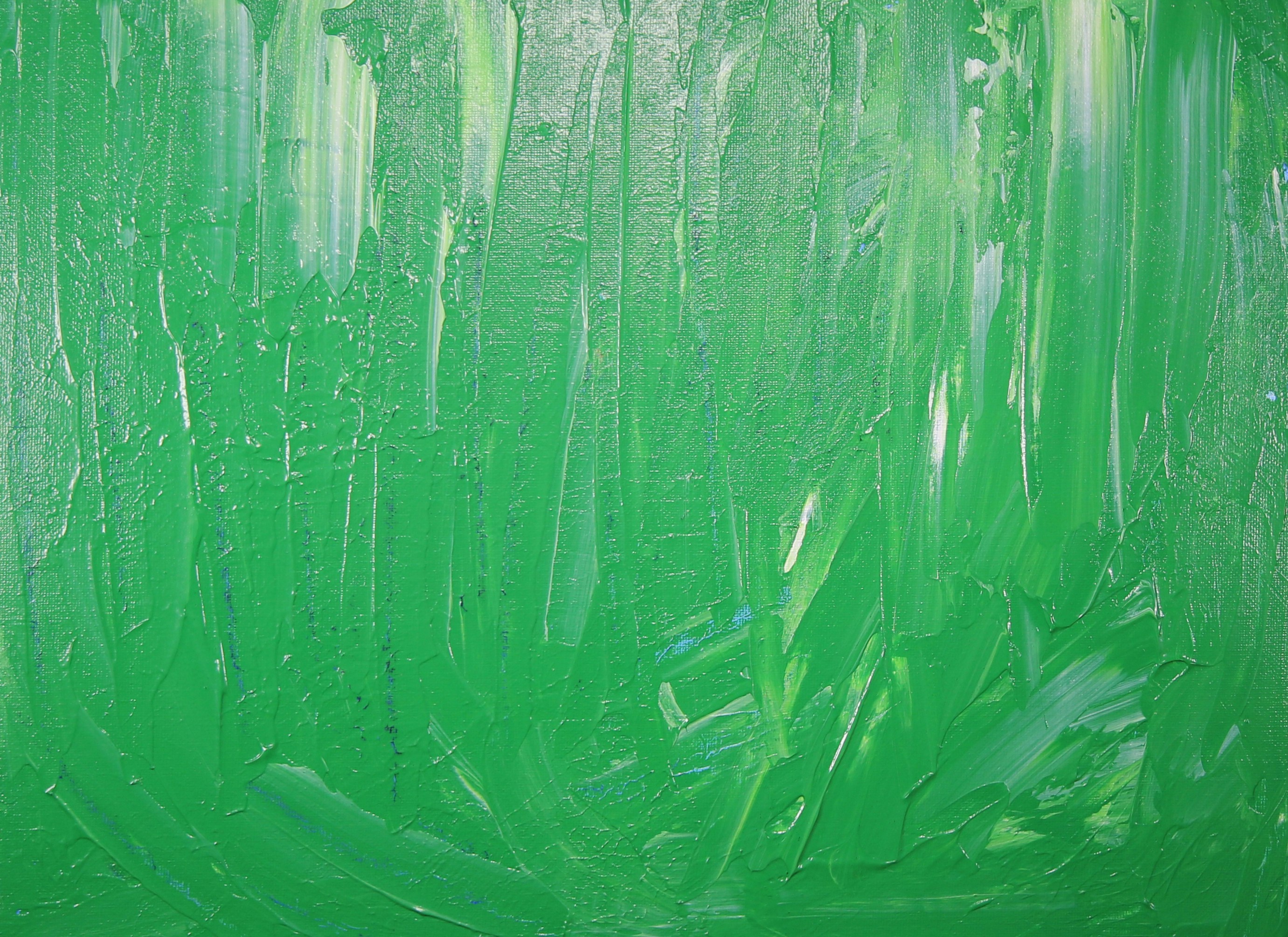 An abstract painting of green paint on a green background photo Free