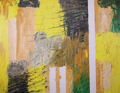 An abstract painting with bold, dynamic brushstrokes and a mix of colors, predominantly yellow, brown, black, green, and white. Vertical white lines intersect with the colorful texture, adding contrast and depth. The paint appears thick, with visible brush marks creating a textured and layered effect.