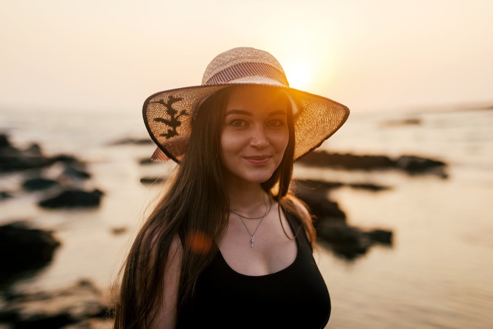 woman wearing brown hat