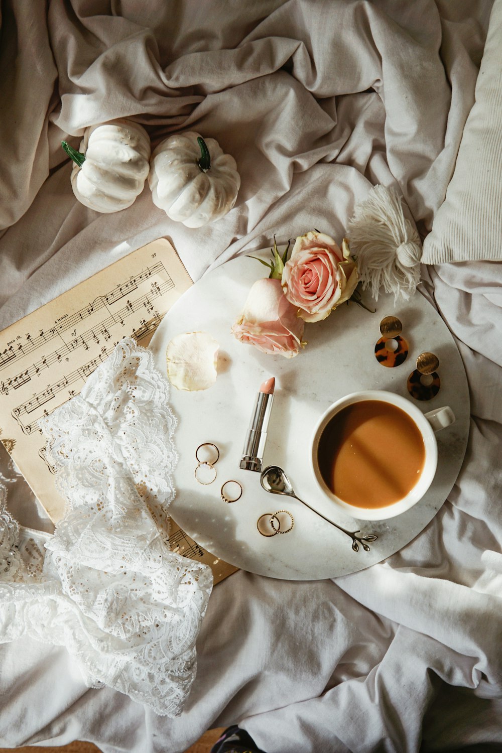 white ceramic teacup on tray