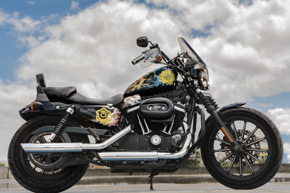 parked black and yellow motorcycle at daytime