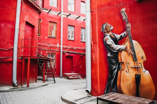 man playing cello mural