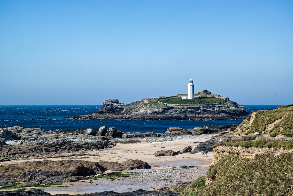 white concrete lighthouse