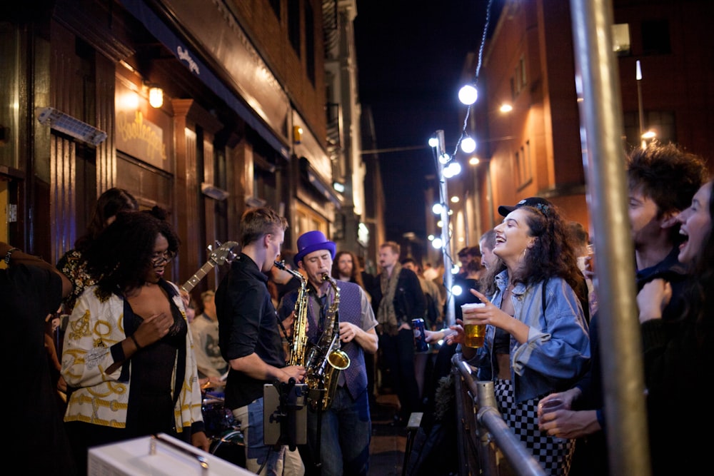 people playing music instrument at night