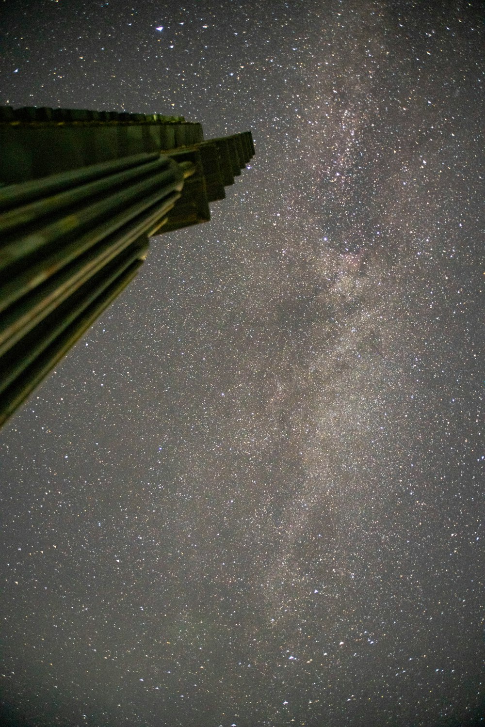 low-angle photography high-rise building during night time