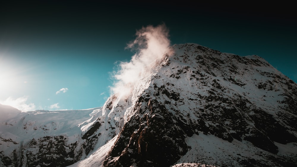 mountain covered with white snow