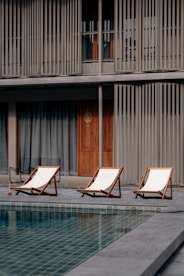 three pool chairs