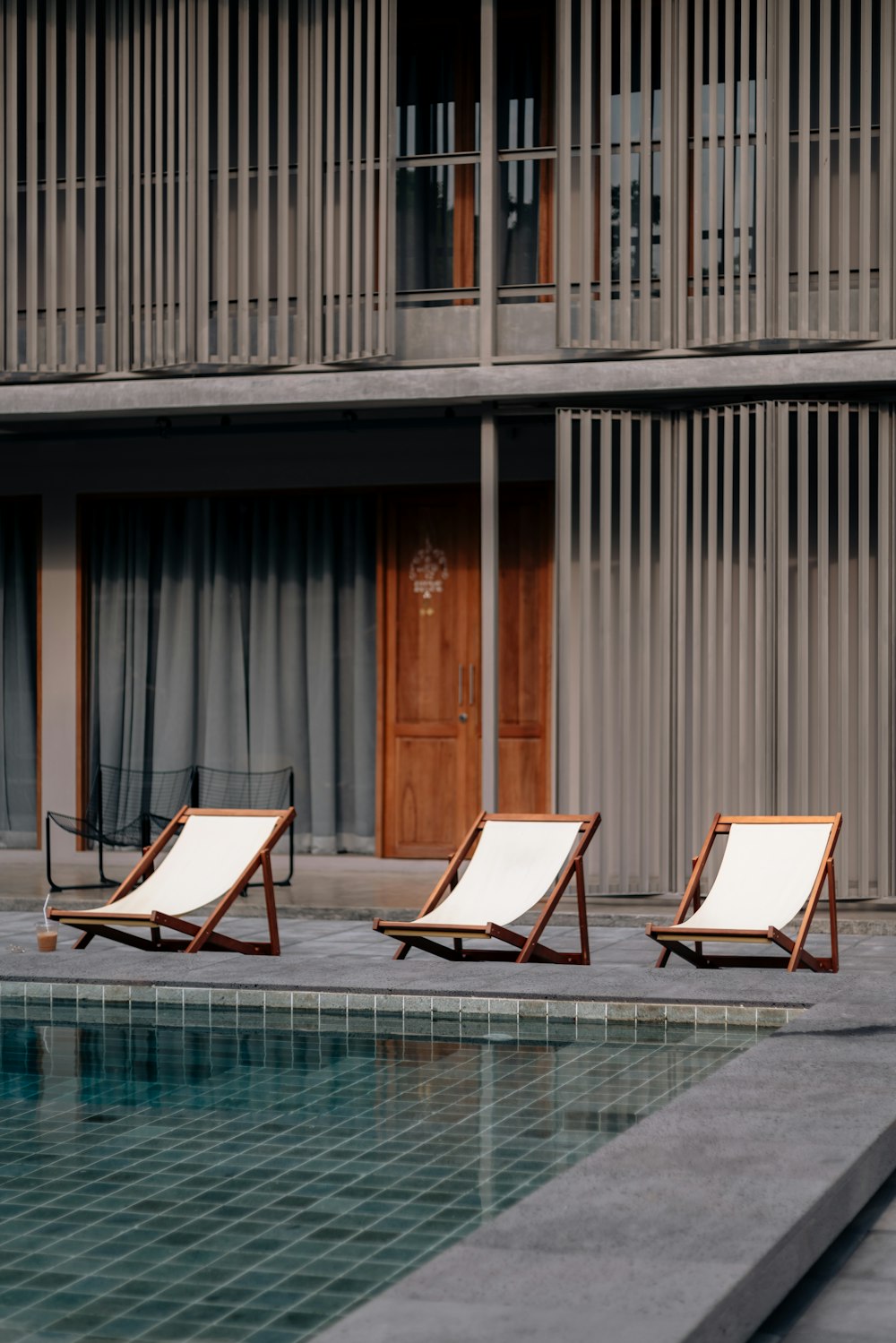 three pool chairs