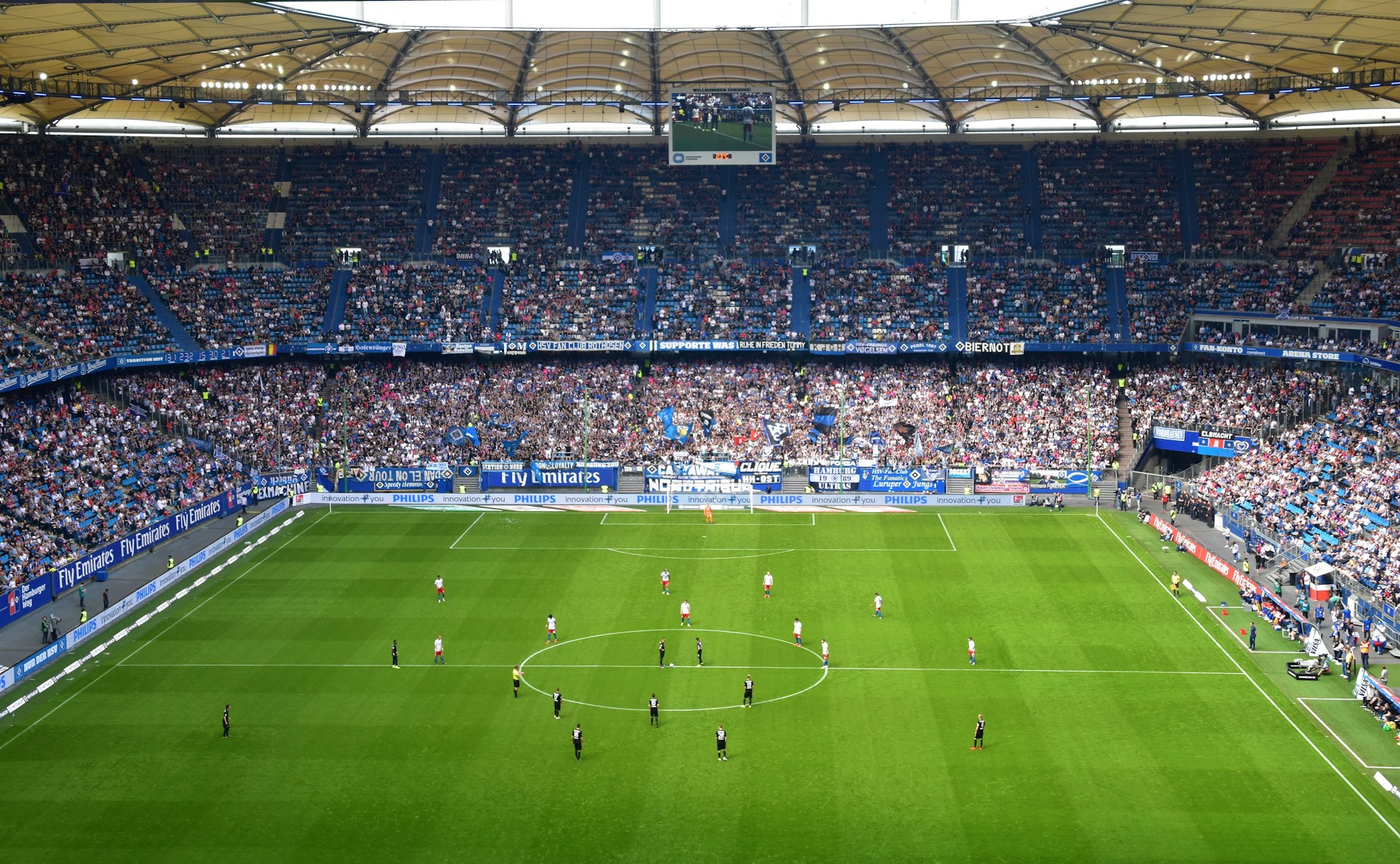 people inside soccer stadium during day