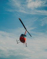 red helicopter on focus photography