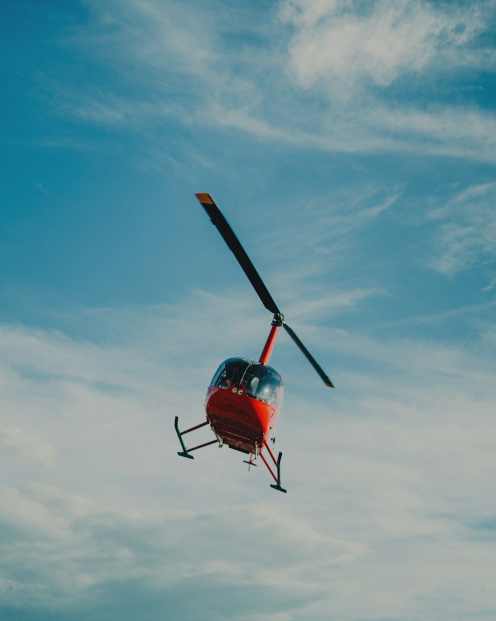 red helicopter on focus photography