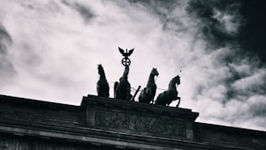 A symbolic depiction of the four horsemen of the apocalypse in a dramatic, artistic style