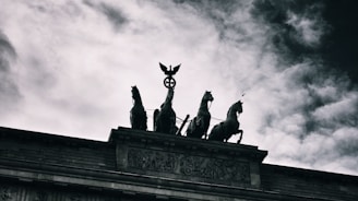 A symbolic depiction of the four horsemen of the apocalypse in a dramatic, artistic style