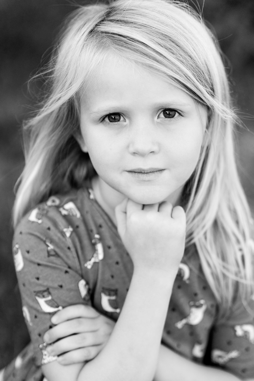 graysale photography of girl wearing long-sleeved top