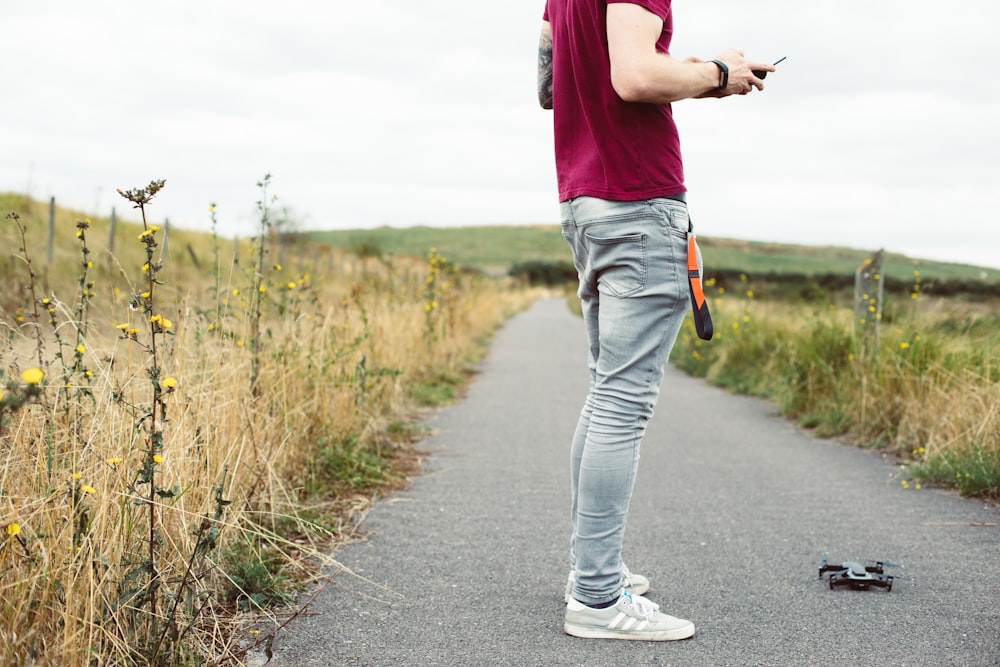 man holding remote control