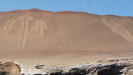 brown mountain during daytime photo in Reserva Nacional de Paracas Peru