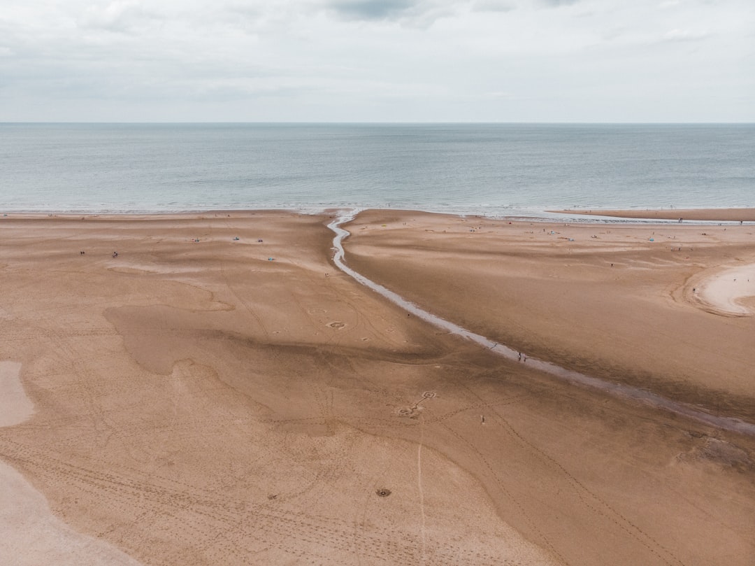 ocean under cloudy sky