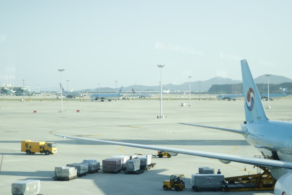 white airplane on airport