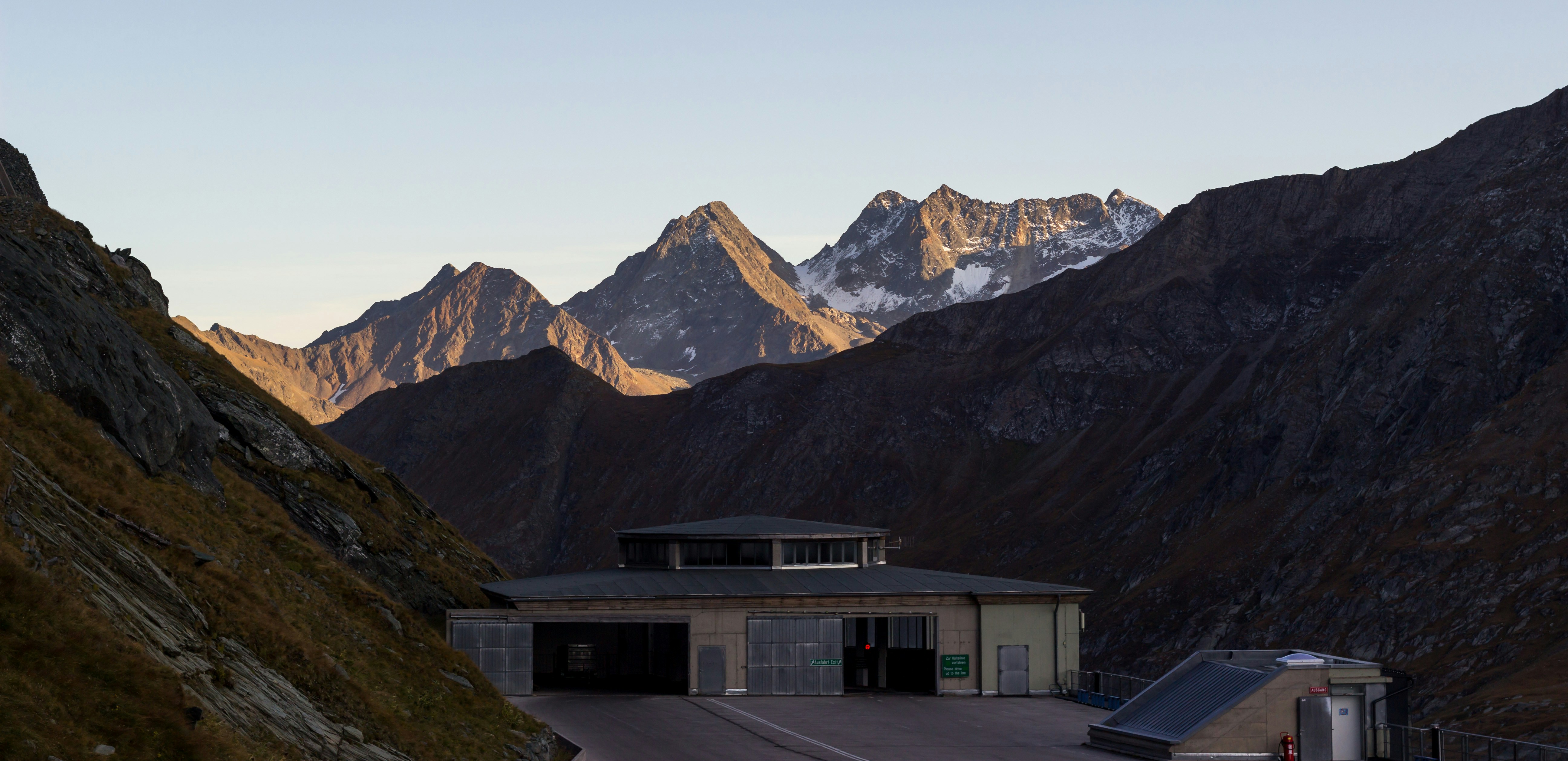 house near mountain at daytime
