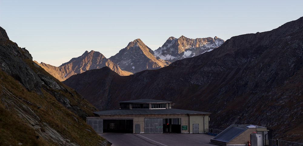 house near mountain at daytime