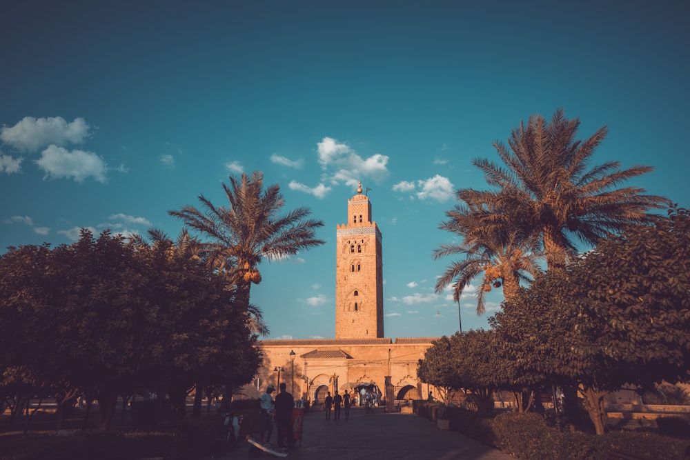 a tall clock tower towering over a city