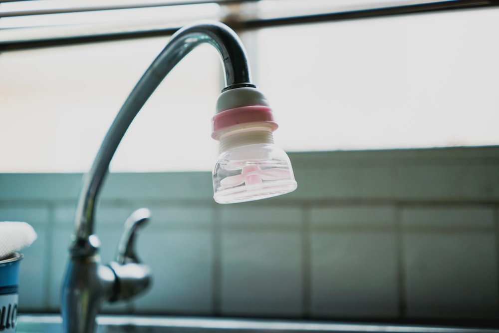 Water Filter Attached On A Faucet Photo Free Sink Faucet Image