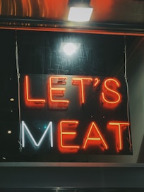red Let's Meat neon signage
