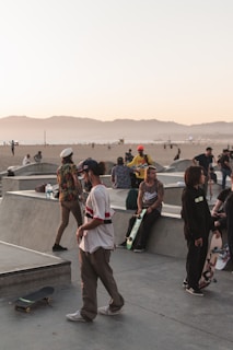 A group of skateboarders celebrating after a competition.