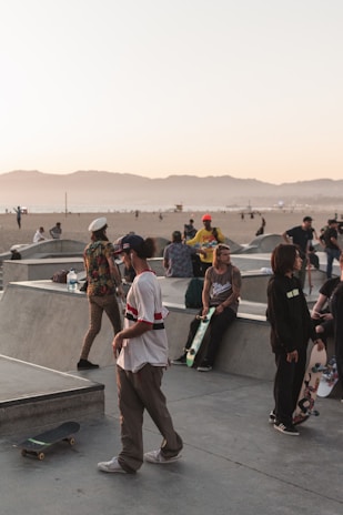 A group of skateboarders celebrating after a competition.