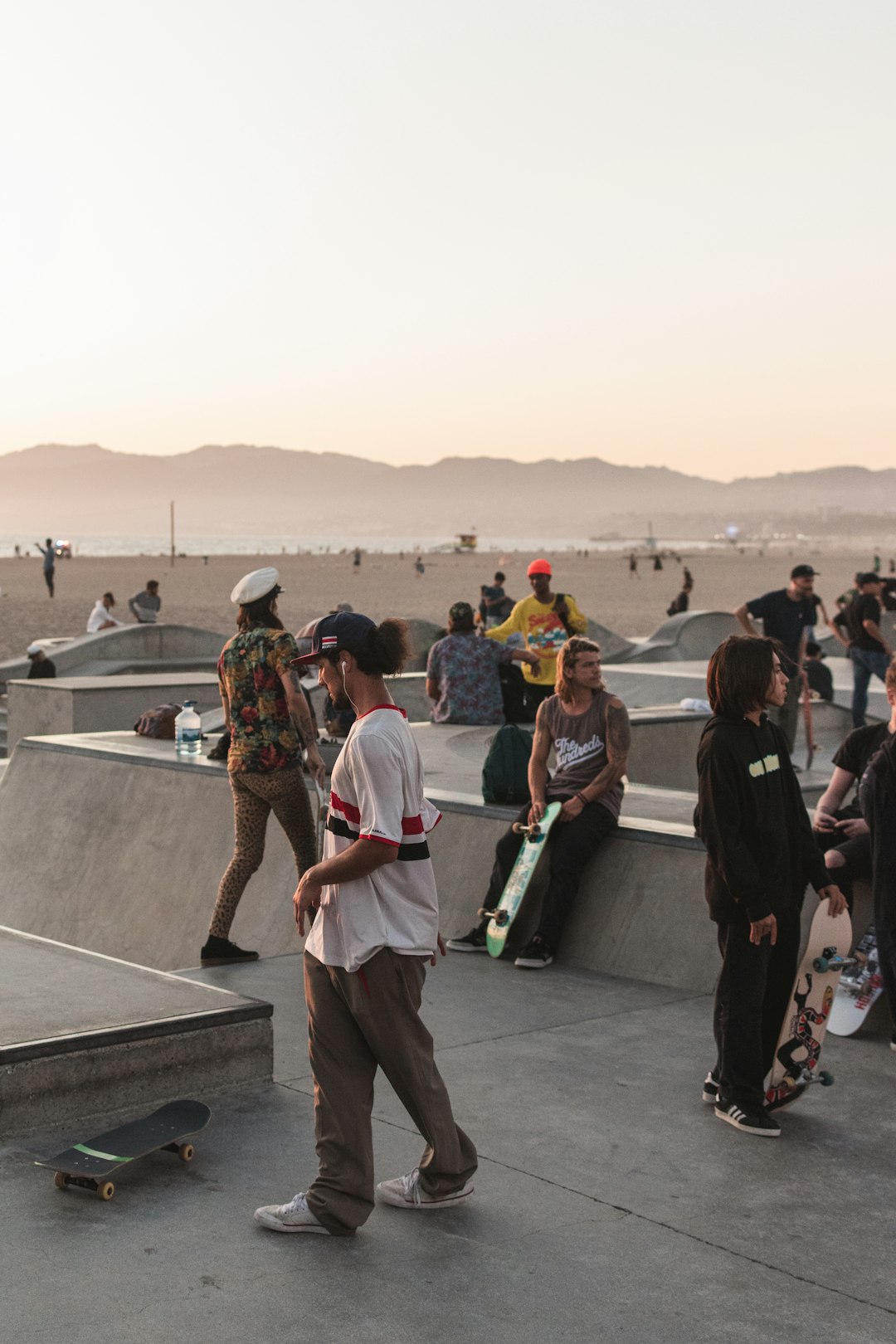 people gathered with skateboards