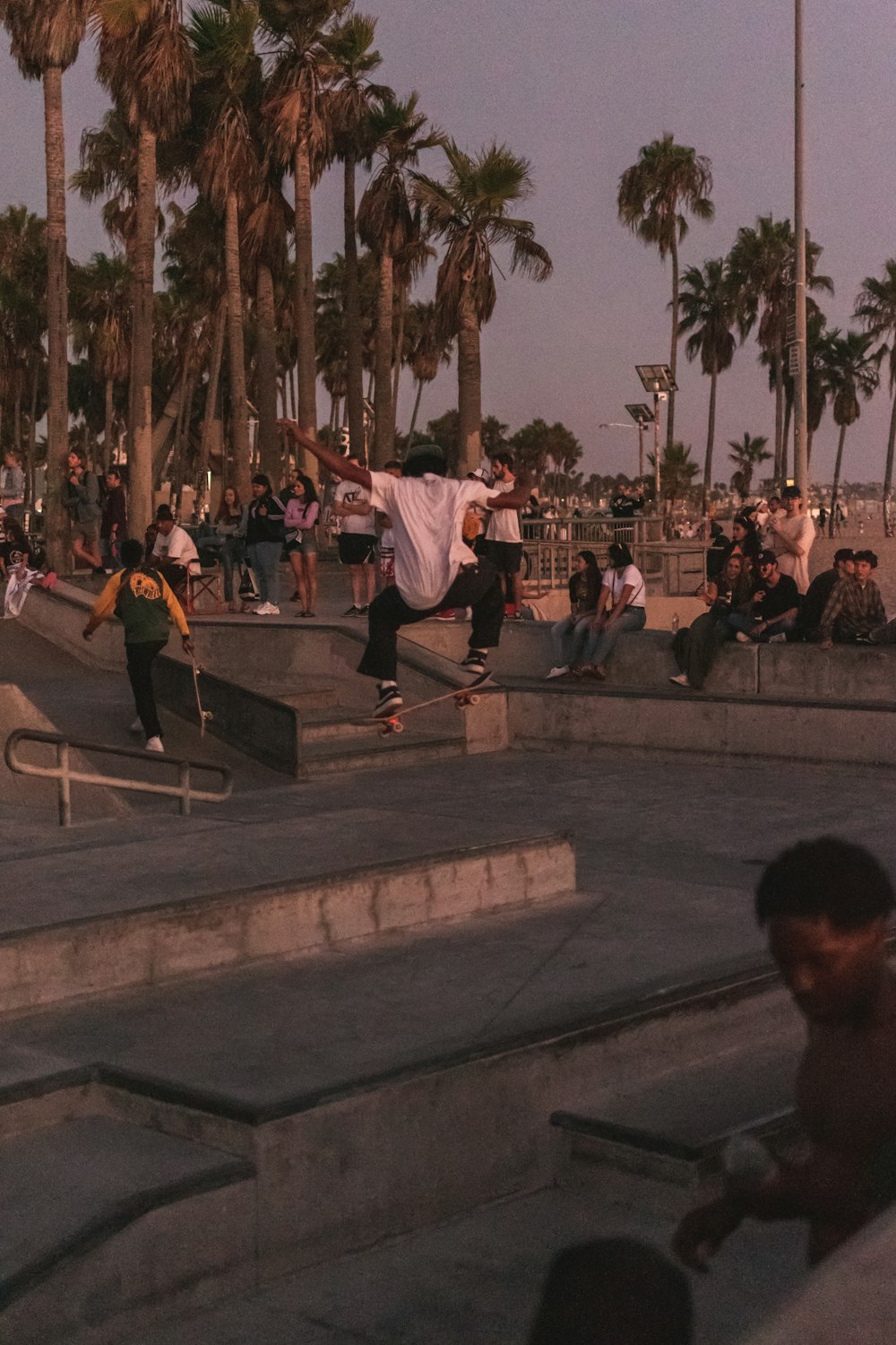 time-lapse photography of man doing skateboard tricks