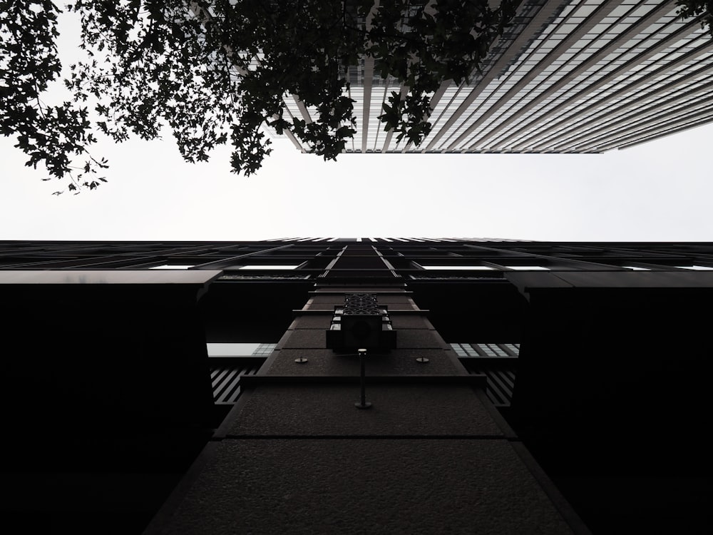 black and gray concrete buildings under white sky