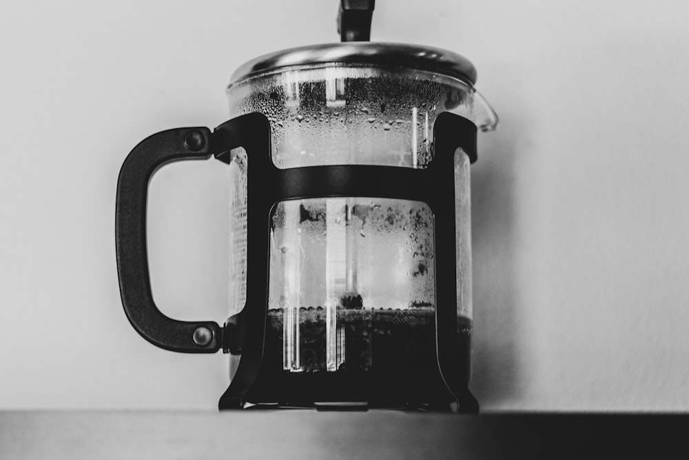 grayscale photography of coffee press