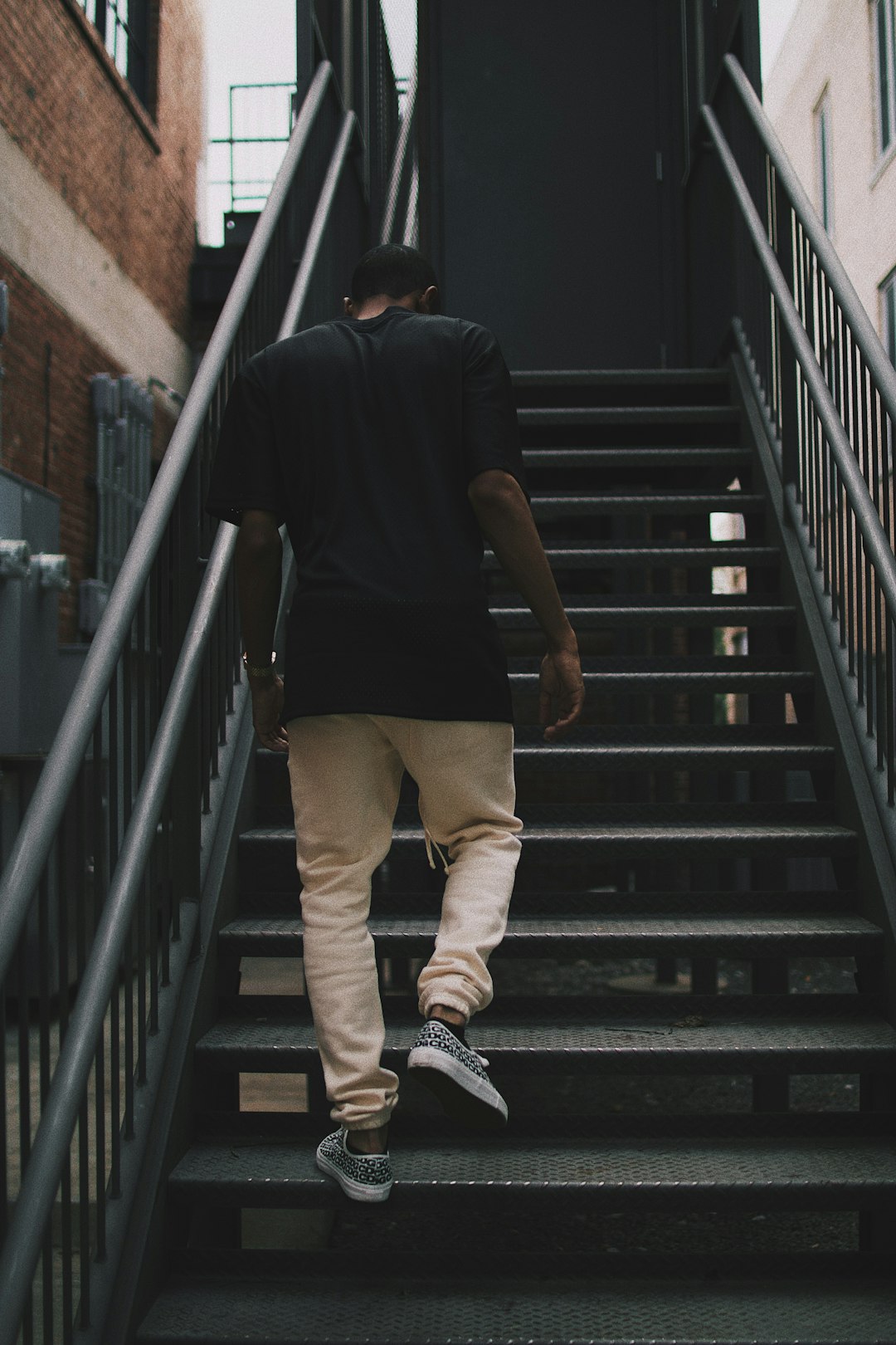 man walking on stair