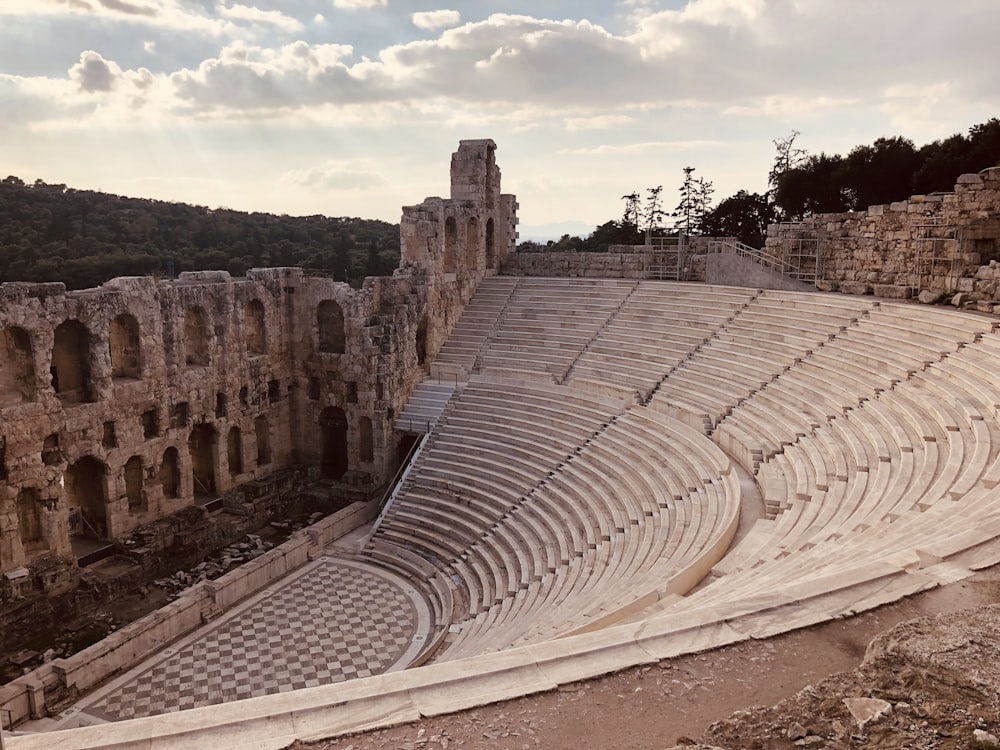Odeon of Herodes Atticus in Athens, Greece under white and blue skies during daytime