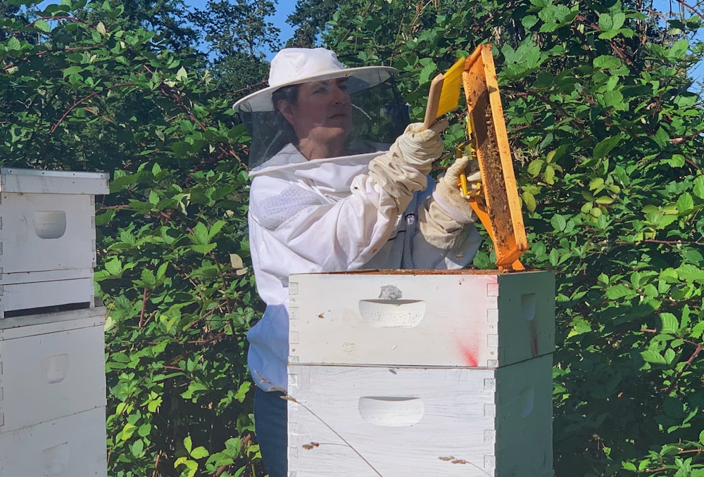 woman holding honey comb