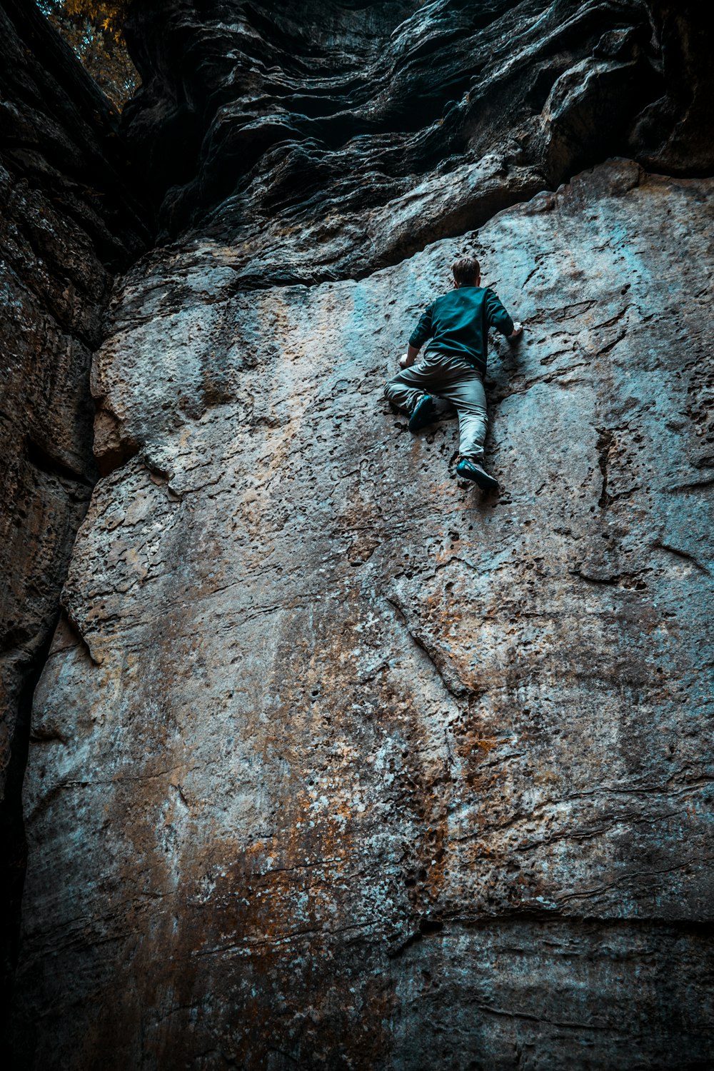 man climbs on mountain