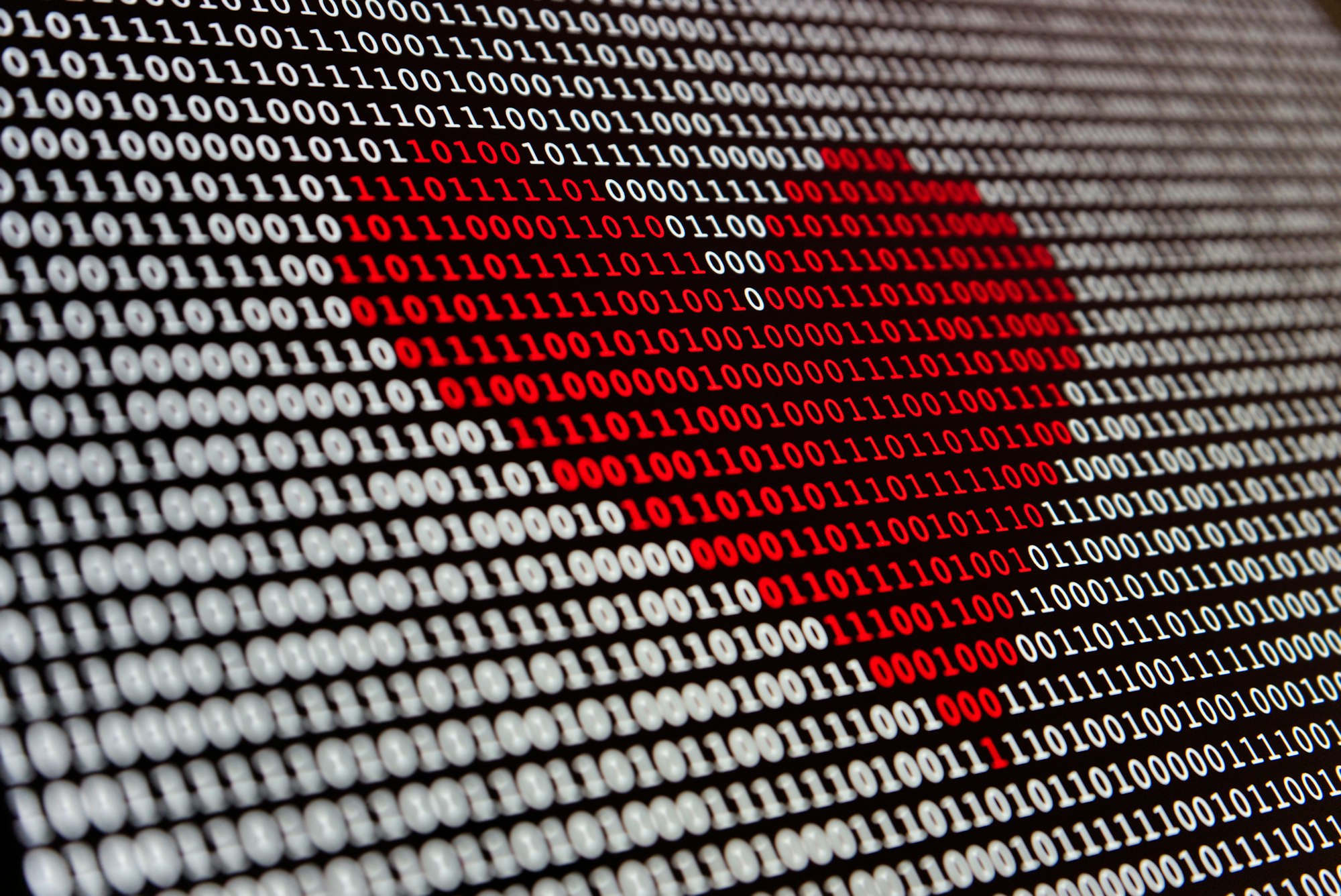 Red heart made out of binary digits