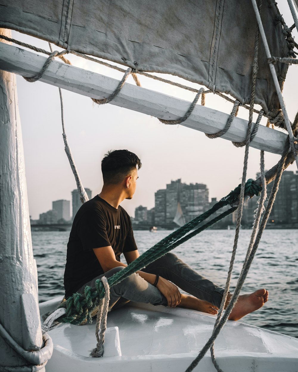 man sits on boat