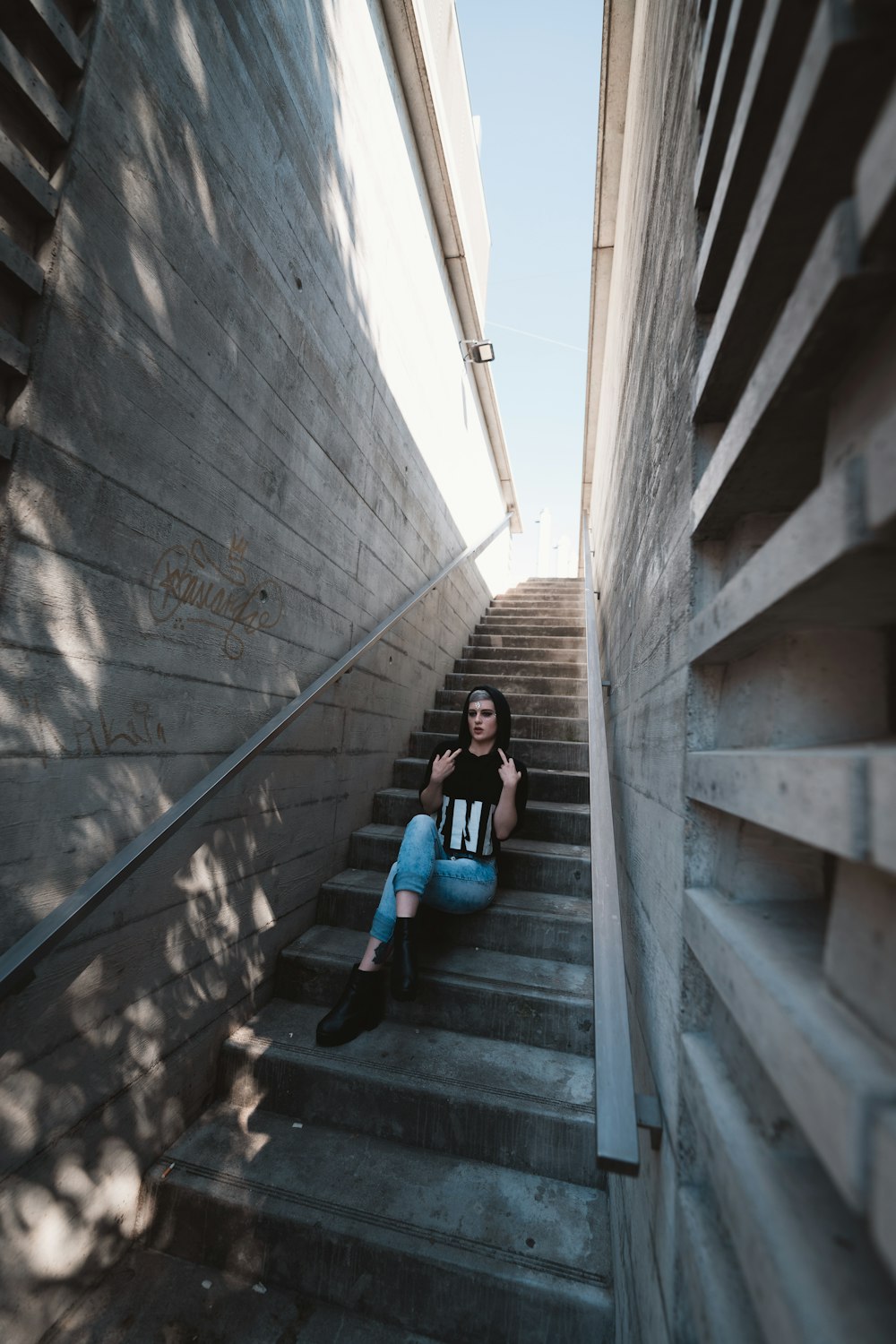 woman sitting on stairs