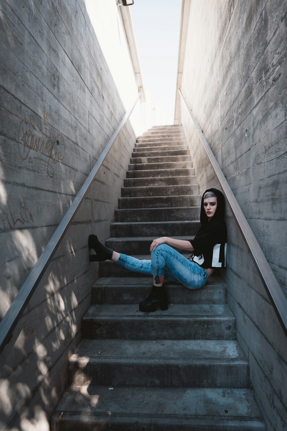 woman sitting on stairs
