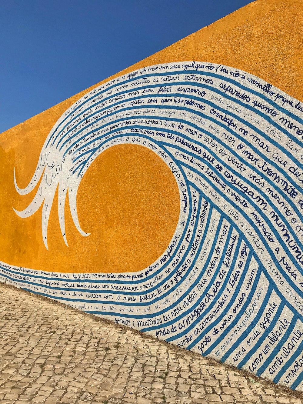 orange, blue, and white wave art