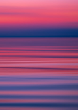 An abstract horizon where color and light blend to suggest a timeless, spiritual space.