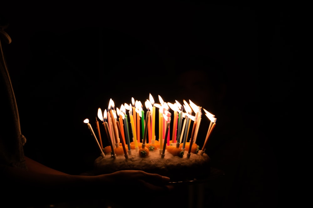 lighted candles on cake