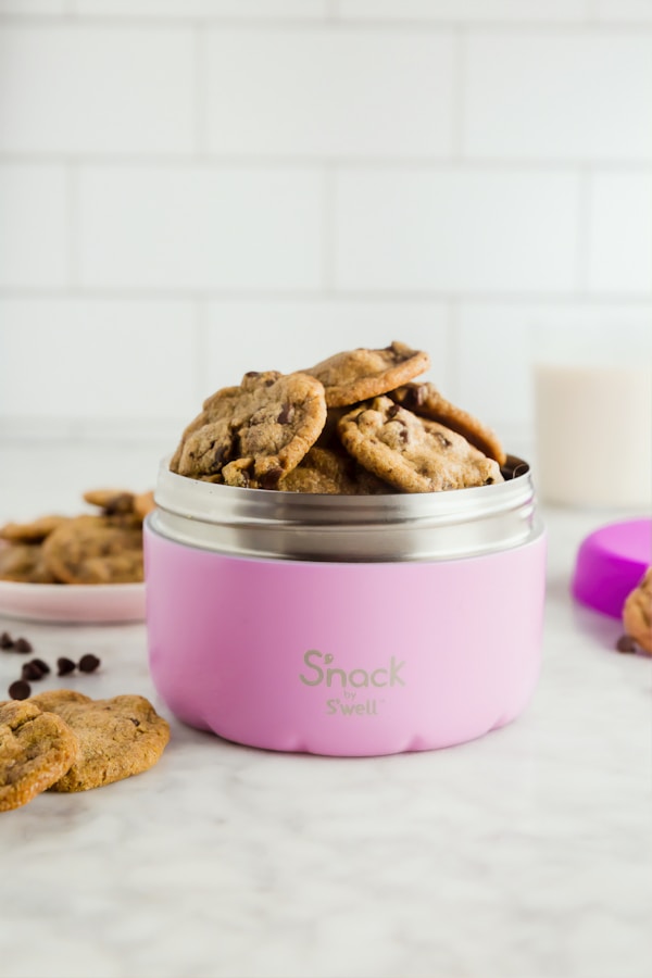 Bunch of cookies in pink food container
